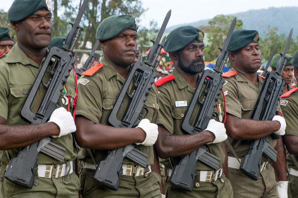 Members of the Vanuatu Mobile Force march past the reviewing stand at Vanuatu's 35th independence anniversary celebrations.
