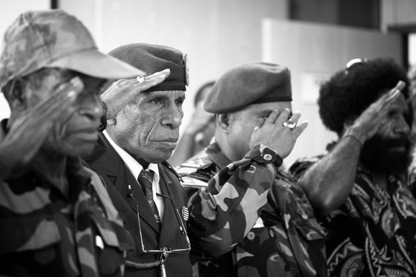 Members of the West Papuan resistance salute the Prime Minister of Vanuatu during his meeting with the ULMWP.
