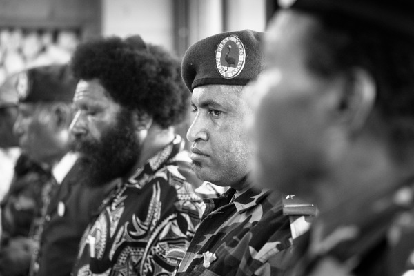 Members of the West Papuan resistance salute the Prime Minister of Vanuatu during his meeting with the ULMWP.
